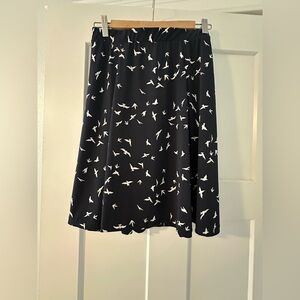 Dark indigo skirt with bird pattern